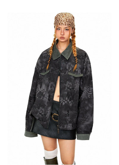 A person wearing a leopard print jacket, a skirt, and a leopard print hat stands against a white background.